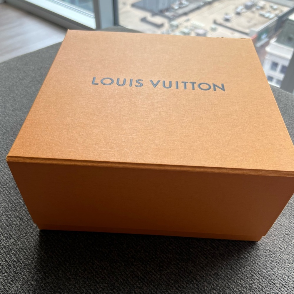 Louis Vuitton magnetic box with dust bag and strings included!